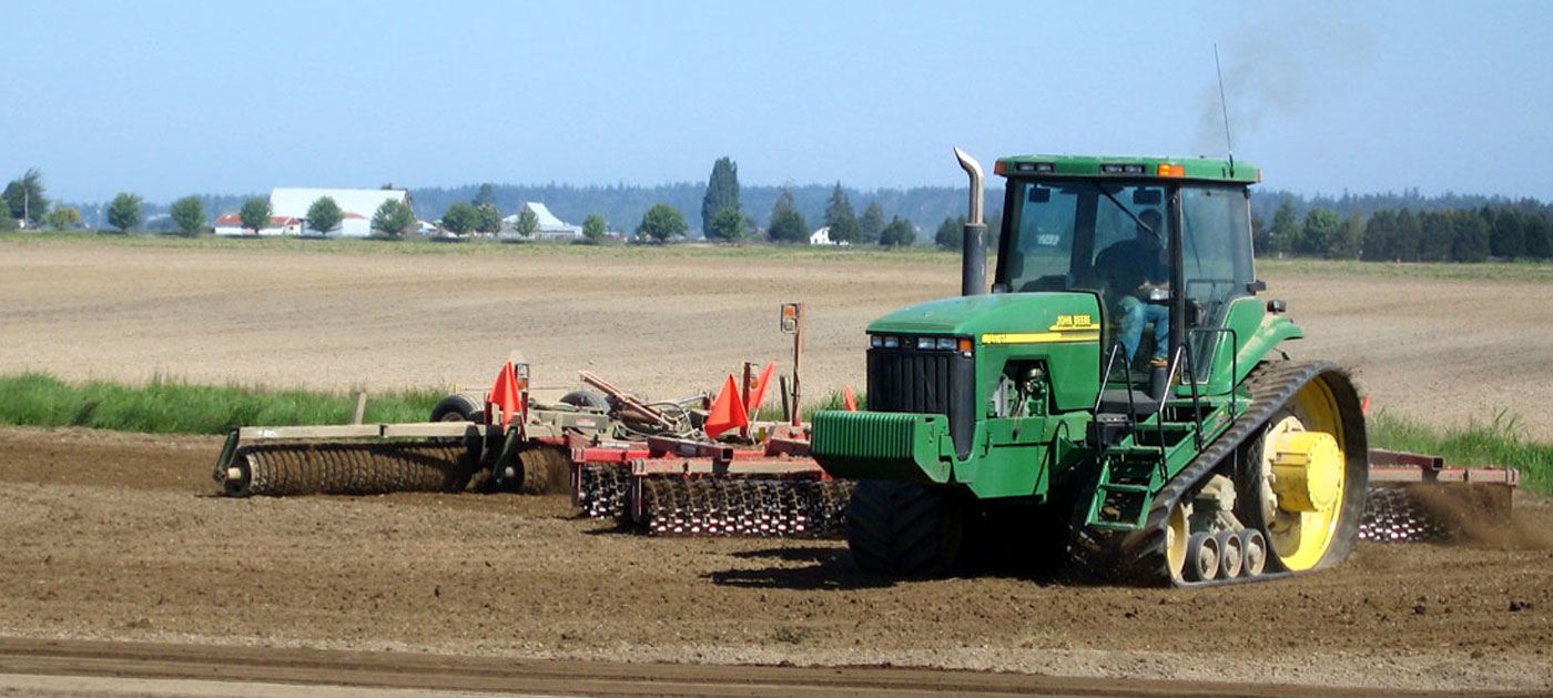 tractor plowing soil